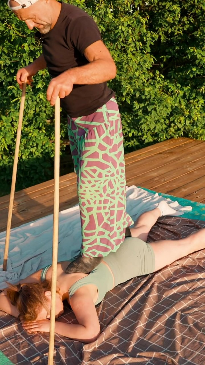 Did you know your back muscles work nonstop to support your entire upper body against gravity? This is why gravity-assisted massage, where a therapist stands on the recipient's back, can be so effective. Using their feet, they apply broad, deep pressure a
