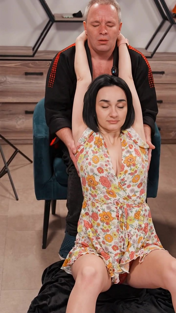 Is your upper back mobility restricted from prolonged sitting? This assisted thoracic extension mobilization uses the patient's elevated arms to create leverage. The practitioner applies gentle, sustained pressure to the upper back and shoulders, targetin