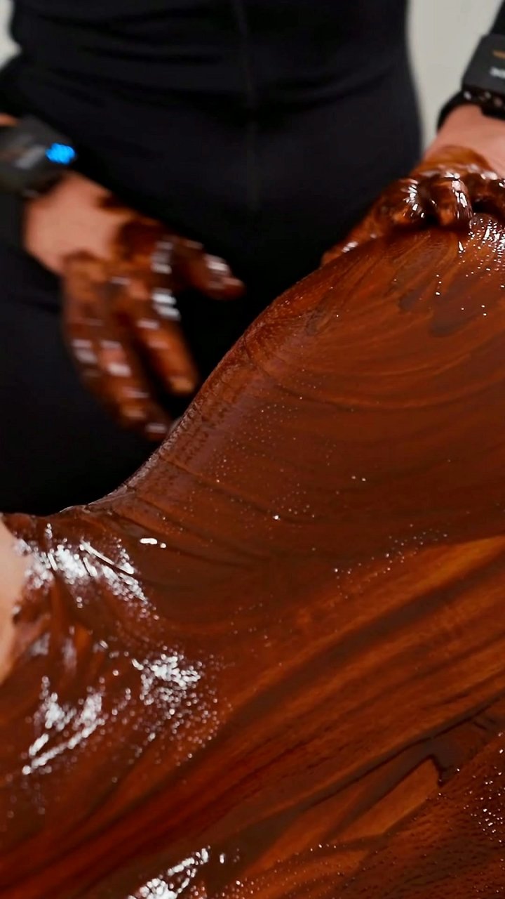 Your daily rush doesn't have to leave you feeling heavy with tension—this ASMR massage offers another way. Smooth strokes across skin with thick chocolate paste create such warm ASMR pacing for anyone needing quiet moments 🍫 This gentle ritual eases that 