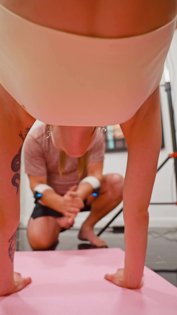 Are you neglecting scapular stability in your inversions? This position requires deep core activation to stabilize the lumbar spine, while the glutes engage to maintain pelvic neutrality. Proper form demands scapular protraction to support the shoulder gi