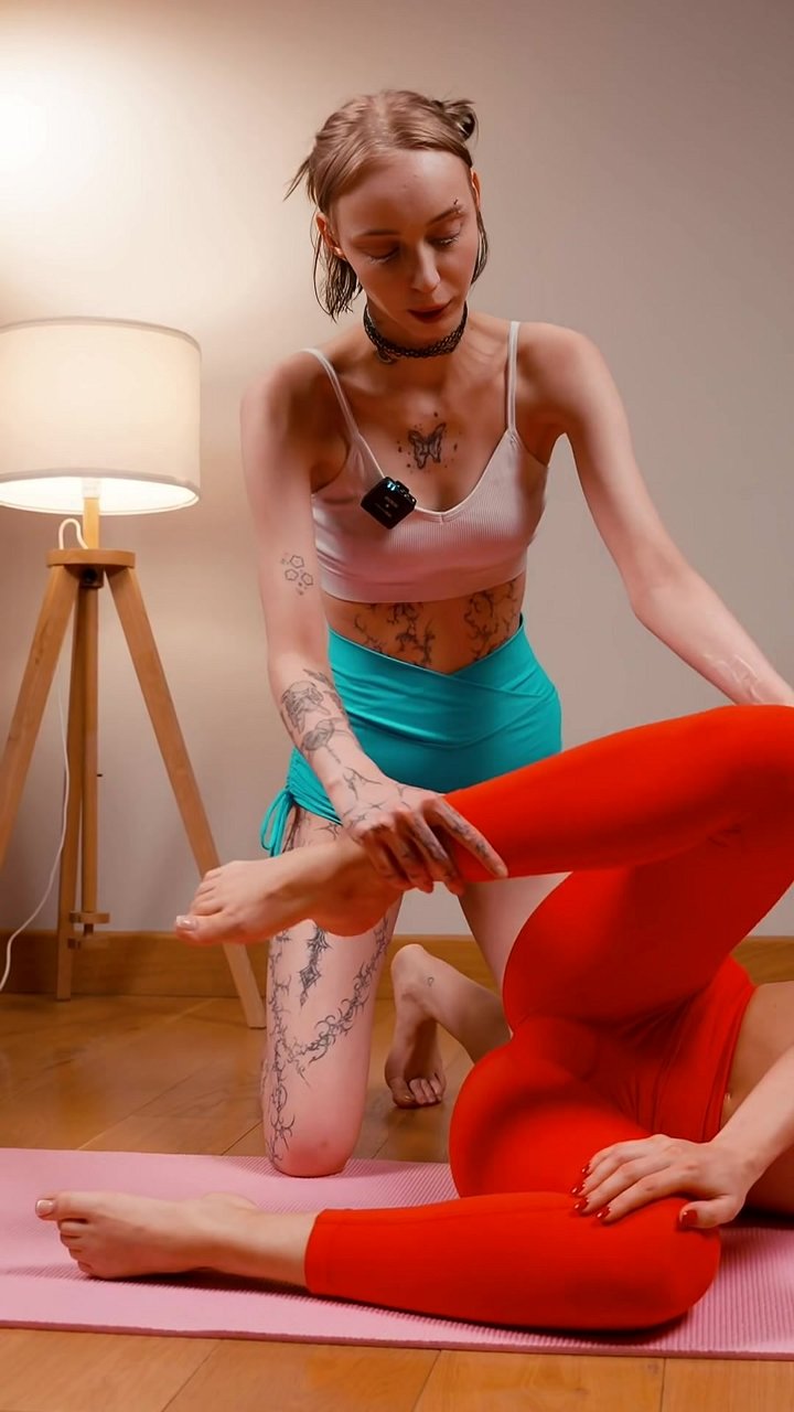 Do your hips feel locked and tight after sitting all day? This assisted external hip rotation is a game-changer for releasing deep tension. A partner gently guides your bent knee across your body while you lie flat, targeting the deep gluteal muscles and 