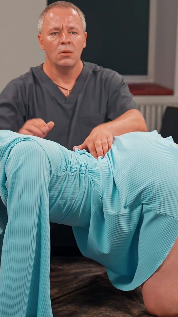 Does your lower back feel tight and compressed after sitting all day? This assisted lumbar stretch uses stabilizing pressure on the lower back and waist while you bend forward into an arched pose. This technique helps decompress the lumbar spine and relea